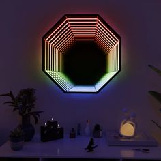 a room with a white table and a neon light in the corner on the wall