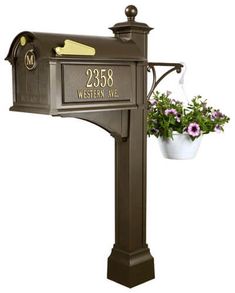 a mailbox with flowers in it is shown