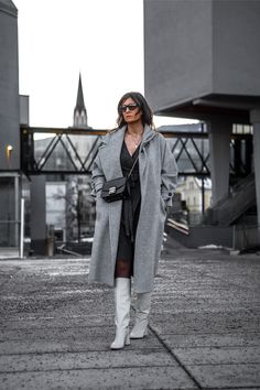 Whoever claimed that a knit wrap dress must be dull clearly hasn't explored its full potential! | How To Wear A Knit Wrap Dress: Wrap It Up & Unleash Your Style | Grey Knit Wrap Dress Winter Outfits, White Boots, Black Tights Winter Outfits White Boots, Winter Dress Outfits, Dress Winter