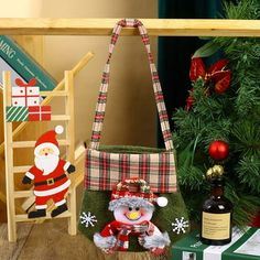 a christmas scene with santa claus holding a wine bottle in front of a tree and other holiday decorations