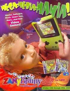 a magazine cover with a young boy holding a gameboy in front of his face