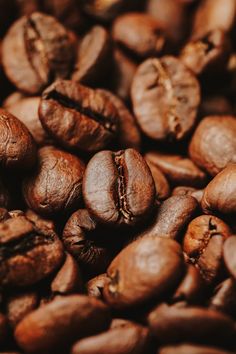 coffee beans are piled up in a pile