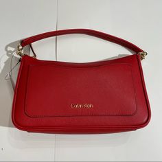 New With Tags Calvin Klein Bag Color- Pop Poppy, Calvin Klein Rectangular Shoulder Bag For Evening, Calvin Klein Evening Rectangular Shoulder Bag, Calvin Klein Rectangular Evening Shoulder Bag, Elegant Calvin Klein Evening Shoulder Bag, Red Top Handle Bag For Spring, Red Shoulder Bag With Branded Hardware For Everyday, Red Top Handle Shoulder Bag For Spring, Red Spring Bags For Errands, Trendy Red Bags With Branded Hardware