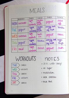 an open notebook with lots of workout notes on the pages and words written in different languages