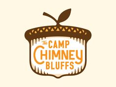 the camp chimney bluffs logo with an orange and brown design on it's side