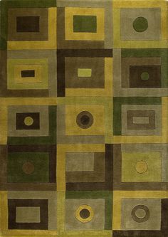 an area rug with squares, circles and rectangles in various shades of green