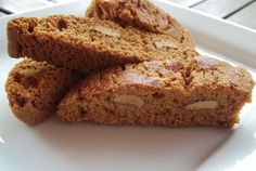 three pieces of bread sitting on top of a white plate