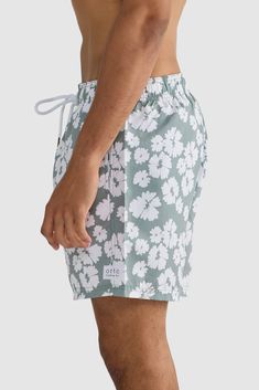 The Apollo Sage Swim Shorts are the perfect addition to your summer wardrobe. Made from 100% Recycled Polyester, these mid-length shorts are quick-drying and lightweight. An elastic waistband with drawstring provides an adjustable fit, while internal fine mesh briefs provide extra comfort. Quick drying, mid-length swim shorts 100% Recycled Polyester Internal fine mesh briefs Elastic waistband with drawstring Two side pockets with rear button up pocket Designed in Australia. Made in China Mid Length Shorts, Biodegradable Packaging, Mens Swim Shorts, Recycled Yarn, Man Swimming, Swim Shorts, Slow Fashion, Summer Wardrobe, Mid Length