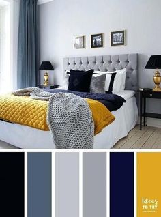 a bedroom with blue, yellow and grey colors