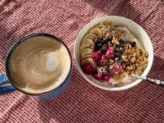 a bowl of cereal and a cup of coffee