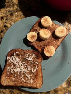 two pieces of toast with banana slices on them