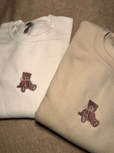 Embroidered teddy bear with bow pullover 🧸🎀 Material: 50% Cotton and 50% Polyester  Sizing Unisex: S, M, L, XL Shipping : We usually need between 1-3 days to make the product, and Worldwide shipping would usually take about 7-15 days to USA and most of countries. If you need fast shipping, we can ship via DHL/UPS, and you can receive it in about 3 to 6 days normally. Once you wash the product the film will disolve.  Please feel free to contact me with any question, We'd love to help.💞