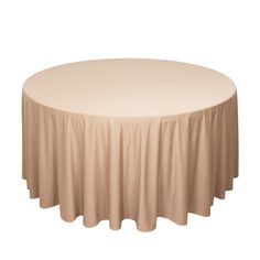 a round table with a white cloth on it