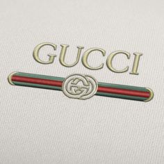 the gucci logo is shown on a white shirt with red and green trims