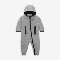 The littlest athletes will be nice and snug in this coverall, which is made of soft knit double bonded jersey fabric that feels gentle on baby's sensitive skin. The full-zip closure makes changing, dressing and layering easy and the hood provides extra coverage and super cozy feels. Baby Clothes Nike, Baby Boy Nike Outfits, Nike Baby Clothes, Baby Boy Nike, Nike Sportswear Tech Fleece, Baby Nike, Mommy Goals