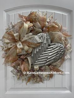 a wreath that is hanging on the front door