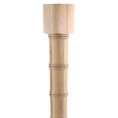 a tall wooden pole with three columns on it's sides and one column at the top