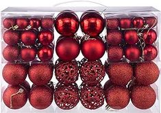 red ornaments in a clear box on a white background