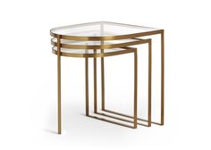 two tables with glass tops and gold metal legs