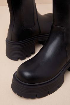 Coveted and extra-cool, the Lulus Torance Black Lug Sole Platform Ankle Booties are perfect for stomping through chilly days! These edgy boots have a smooth, faux leather construction that shapes a Chelsea-inspired silhouette with a rounded toe upper (atop a 1.5"" toe platform) that rises to an ankle-high shaft with elastic gussets at the sides. A chunky, textured lug sole completes the trendy look, while a pull tab at the back makes the slip-on design even easier to style! 2. 5" rubber heel. Cushioned insole. Rubber sole has nonskid markings. All Man Made Materials. Imported. Lulus | Torance Black Lug Sole Platform Ankle Booties | Size 8.5. Edgy Boots, Lug Sole, Rubber Heels, Ankle Booties, Chelsea, Ankle Boots, Slip On, Faux Leather, Thing 1