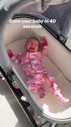 a baby laying in a stroller with the caption calm your baby in 40 seconds