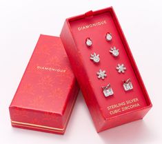 This set of seasonal stud earrings truly captures the spirit of Christmas. Make someone's holiday merry and bright with each sparkling pair of Santa hats, reindeer, snowflakes, and presents. Santa Hat, Merry And Bright, Christmas Spirit, Reindeer, Sparkle, Stud Earrings, Sterling Silver, Christmas, Silver