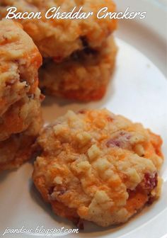 three cookies sitting on top of a white plate