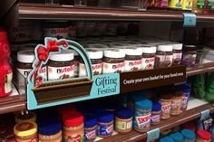 a shelf in a store filled with lots of different types of condiments and sauces