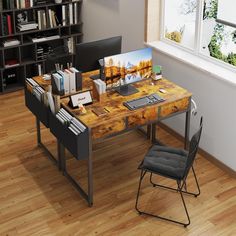 a computer desk with a keyboard and monitor on it in front of a bookcase