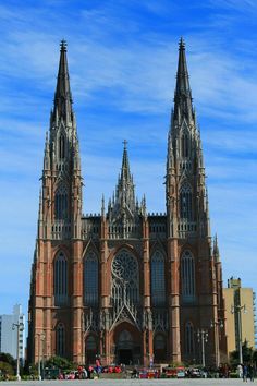 the large cathedral has many spires on it's sides