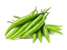 green beans are piled up on top of each other