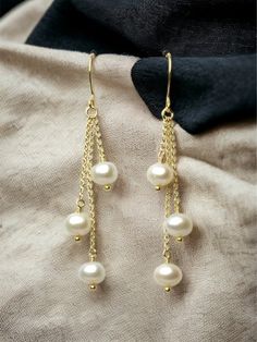 "A gorgeous and classy pair of pearl earrings with high quality freshwater pearls that will be great for your wedding day, as a gift for your bridesmaids or any special woman in your life! They look perfect with every colour and outfit! - Total length of the earrings: ~ 2.5 inches (6.5 cm)  - You can choose between solid sterling silver, 24k gold plated sterling silver or rose gold plated sterling silver. - All earrings are sent to you with silicon backs. PEARL PROPERTIES: * Offer optimism, vitality, wellness, health, longevity and strength. * Symbolize clarity in \"darkness\", wisdom, happiness, love and the good that lies within each person.  * Help us to get in contact with the simple and real things of life. * Offer peace, calmness, honesty, purity and integrity of character. SENDING A Pearl Properties, Pearl Dangle Earrings Wedding, Diy Earrings Pearl, Earrings Gold Pearl, Seed Bead Bracelets Tutorials, Jewelry Packaging Design, قلادات متدلية, Earrings Diy Handmade, Real Pearl Earrings