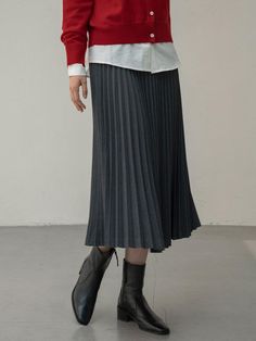 This Wool Blend Pleated Skirt showcases a refined and sophisticated style with its neatly held accordion pleats and excellent drape fabric, exuding feminine mood.- Long length that makes your outfit stylish- Subtle sheen beautifully expressed with movement- Versatile item that can be styled with any top* The actual color of the product is the most similar to the product cut. Formal Long Skirt With Folds, Fitted Bottoms With Folds In Midi Length, Elegant Gray Flowy Skirt, Elegant Long Gray Skirt, Elegant Solid Bottoms With Folds, Flowy Skirt With Accordion Pleats In Solid Color, Elegant Solid Pleated Skirt For Winter, Formal Skirt With Folds, Long Pleated Skirt For Office