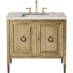 a bathroom vanity with two doors and a sink in the center on an isolated white background