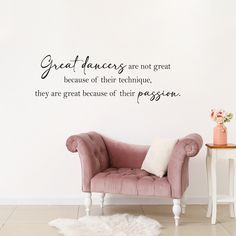 a pink chair in front of a white wall with a quote on it that says great dancers are not great because of their technique, they are great because of their passion