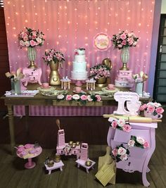 a pink and gold birthday party with lots of cake, decorations and decorating items