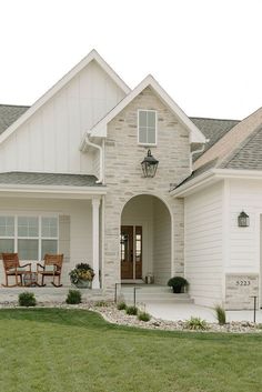 a white house with two brown chairs in front of it and the caption says, has anyone used swiss coffee for my exterior?