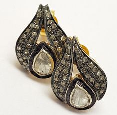 Brand- Jai Kishan Jewellers Item- 925 Sterling Silver Polki Pave Diamond Stud Earring Diamond- Pave and Polki Diamond Earring color- Gold and Black Type- Earring Manufacturing- India Information  We are manufacturing all kinds of jewelry. If you have any queries please contact us. We are Happy To Help You. Antique Earrings Vintage, Jewelry Victorian, Pave Diamond Earrings, Polki Earrings, Earring Gold, Diamond Earring, Wedding Jewelry Earrings, Antique Earrings, Victorian Jewelry