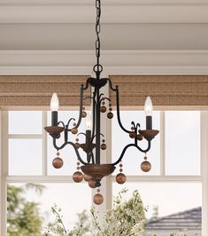 The Old-World Traditional look of our Colonial Charm Collection by Minka-Lavery combines wood and steel for an earthly appearance. Designed in Old World Bronze with Walnut Accents and comes in three different chandelier sizes which will accommodate your home and office décor needs and wants. Perfect for living or dining spaces and adds to the ambiance in bedrooms or even hallways - adding style without overwhelming your existing decor. The chandeliers are engineered to allow adjustable hanging h Classic Chandelier, Charm Collection, 3 Light Chandelier, Minka Lavery, Beaded Chandelier, Residential Lighting, Chandelier Style, Wood Lamps, Black Chandelier