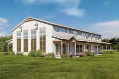 this is an artist's rendering of a modern farmhouse style house with large windows