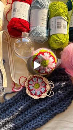 yarn and crochet items laid out on a table