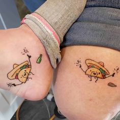 two people with tattoos on their butts, one has a taco and the other has