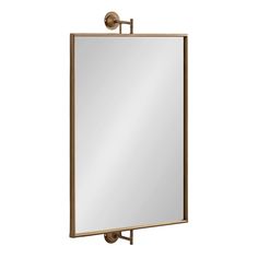 an antique brass finish medicine mirror with a single light fixture on the front and side