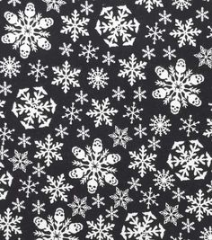 black and white snowflakes with skulls on them are all over the place for this fabric