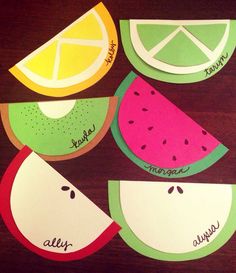 four pieces of fruit cut out to look like watermelon, lemon, and melon slices