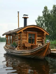 a houseboat is sitting on the water