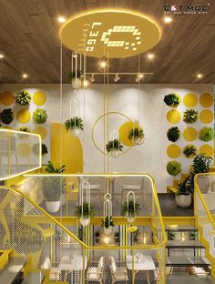 the interior of a restaurant with yellow and white walls, potted plants and chairs