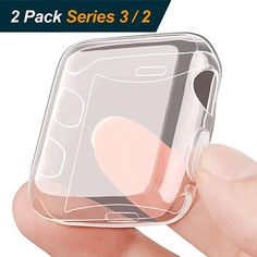 a hand holding a clear plastic case for a cell phone with pink and black hearts on it