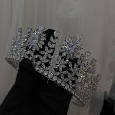 Step into royalty with our Luxurious Bridal Tiara. This silver crown features high-grade cubic zirconia crystals and platinum plating for a dazzling finish. Perfect for brides seeking timeless elegance. Find us on Instagram and TikTok @shop.modishshop. Tiara Silver, Silver Tiara, Hair Jewellery, Tiktok Shop, Silver Crown, Hair Jewelry Wedding, Expensive Jewelry, Quince Dresses, Wedding Tiara