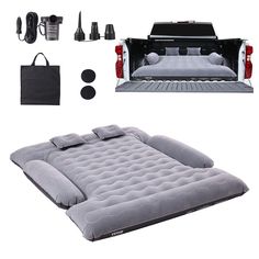 an inflatable bed and accessories for the back of a truck